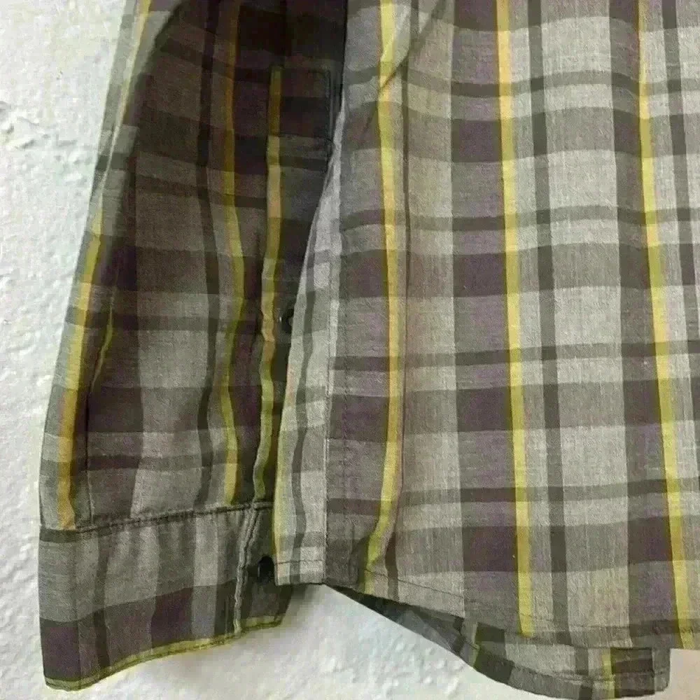 The North Face collared plaid men’s button front shirt